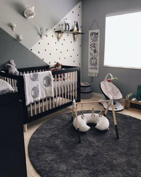 quarto de bebê decorado em tons escuros