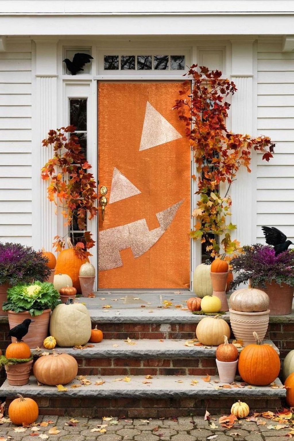 decoração de porta para halloween de abóbora