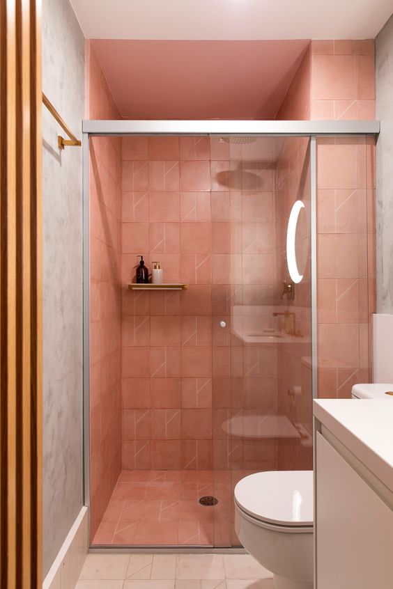 bathroom with pink shower