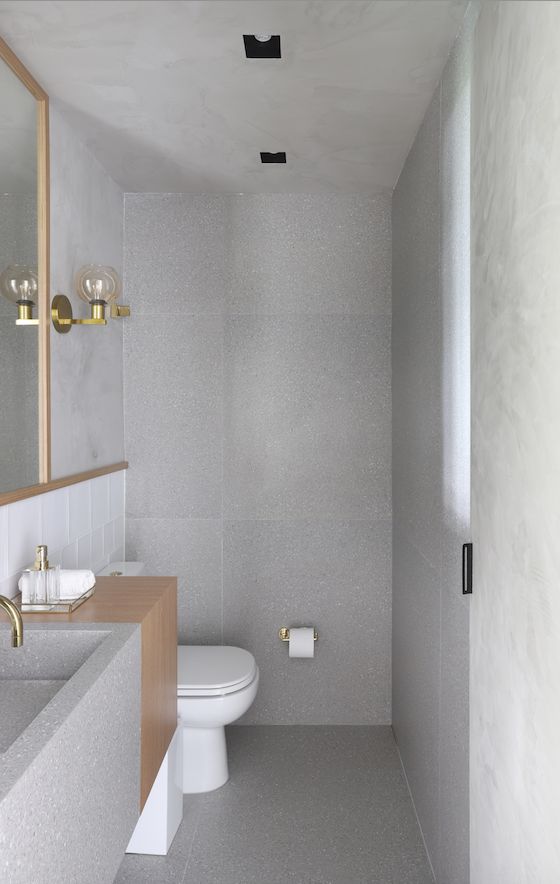 gray bathroom with burnt cement ceiling